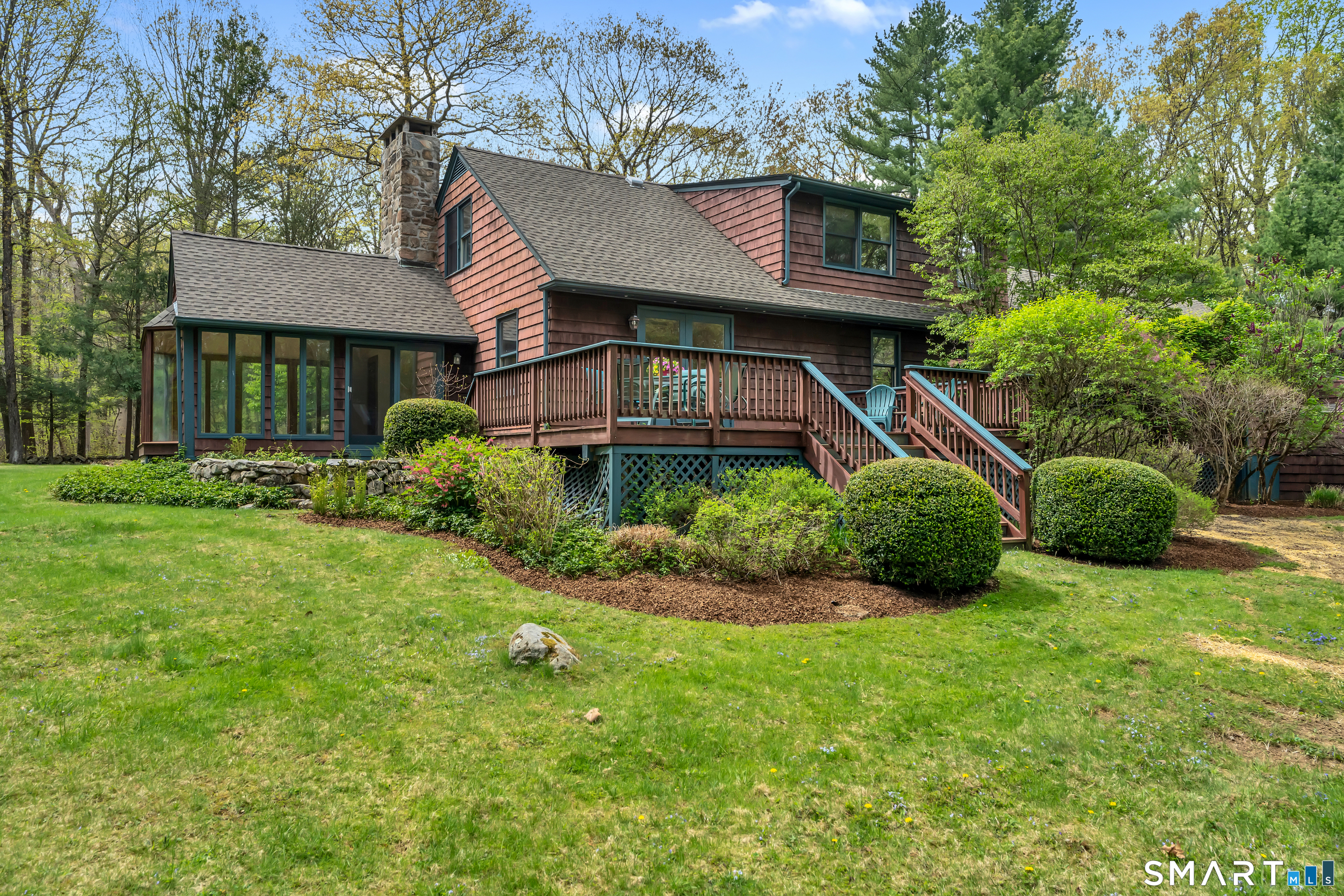 148 Old Redding Road Redding, CT 06896 - Photo 39 of 39 a front view of a house with a yard