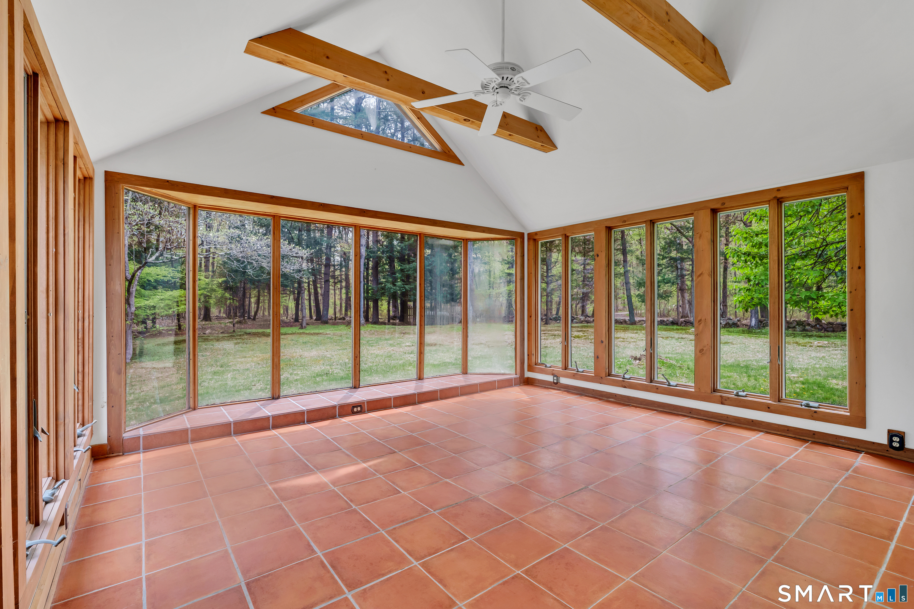 148 Old Redding Road Redding, CT 06896 - Photo 6 of 39 a view of an empty room with a window