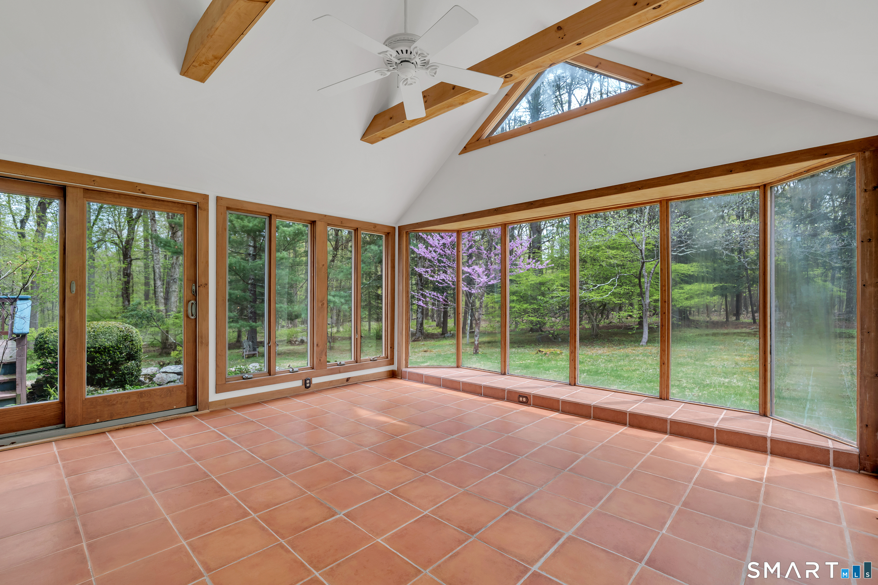 148 Old Redding Road Redding, CT 06896 - Photo 7 of 39 a view of porch with a tv