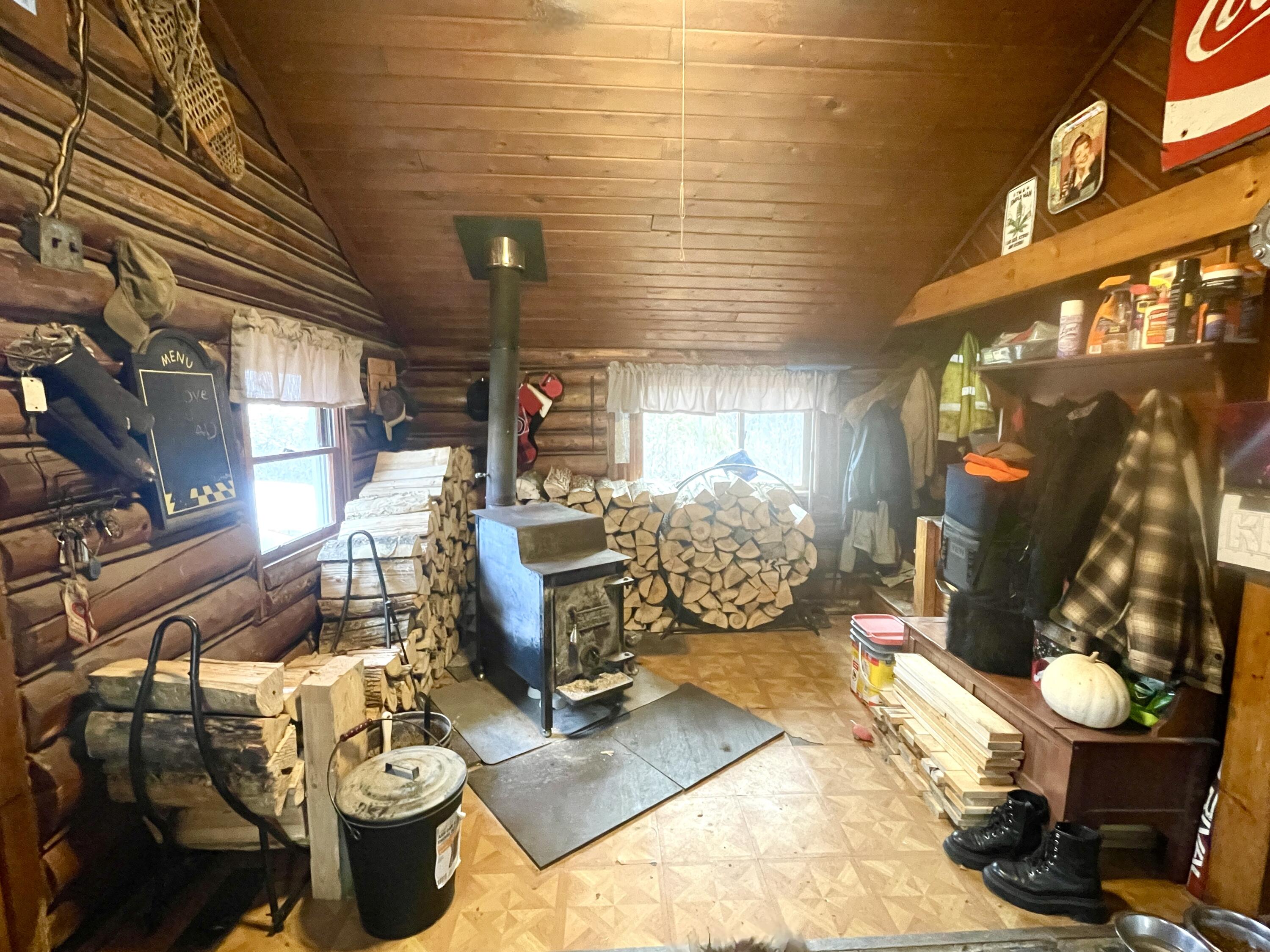 310 Sebec Shore Road Guilford, ME 04443 - Photo 21 of 47 Dining/WoodStove