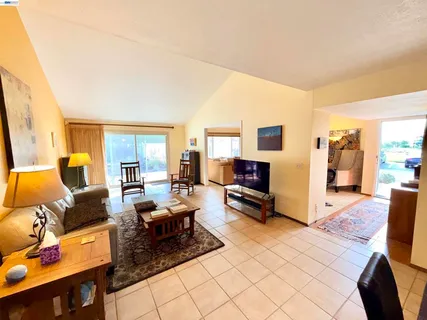 a kitchen with stainless steel appliances a stove a sink and a microwave