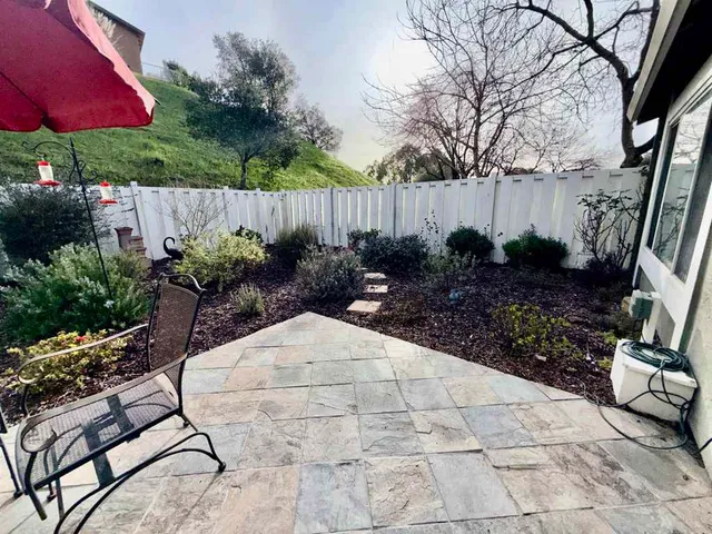 a view of garden with patio