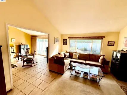 a kitchen with stainless steel appliances a sink stove and microwave