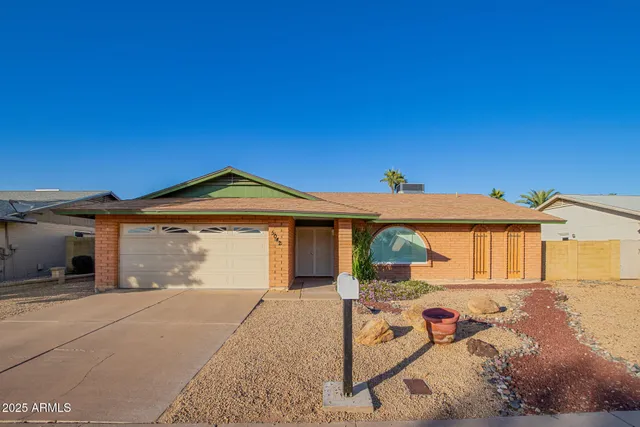 a front view of a house with patio
