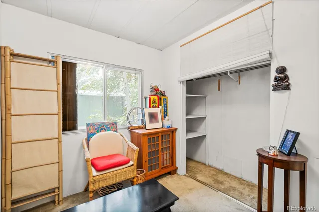 a utility room with closet dryer and washer