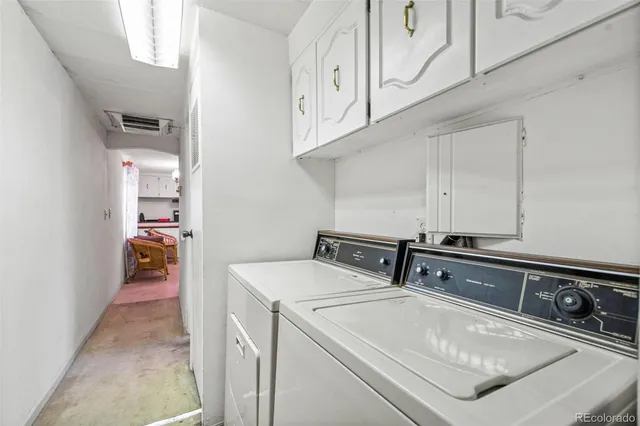 a bathroom with a sink mirror and vanity