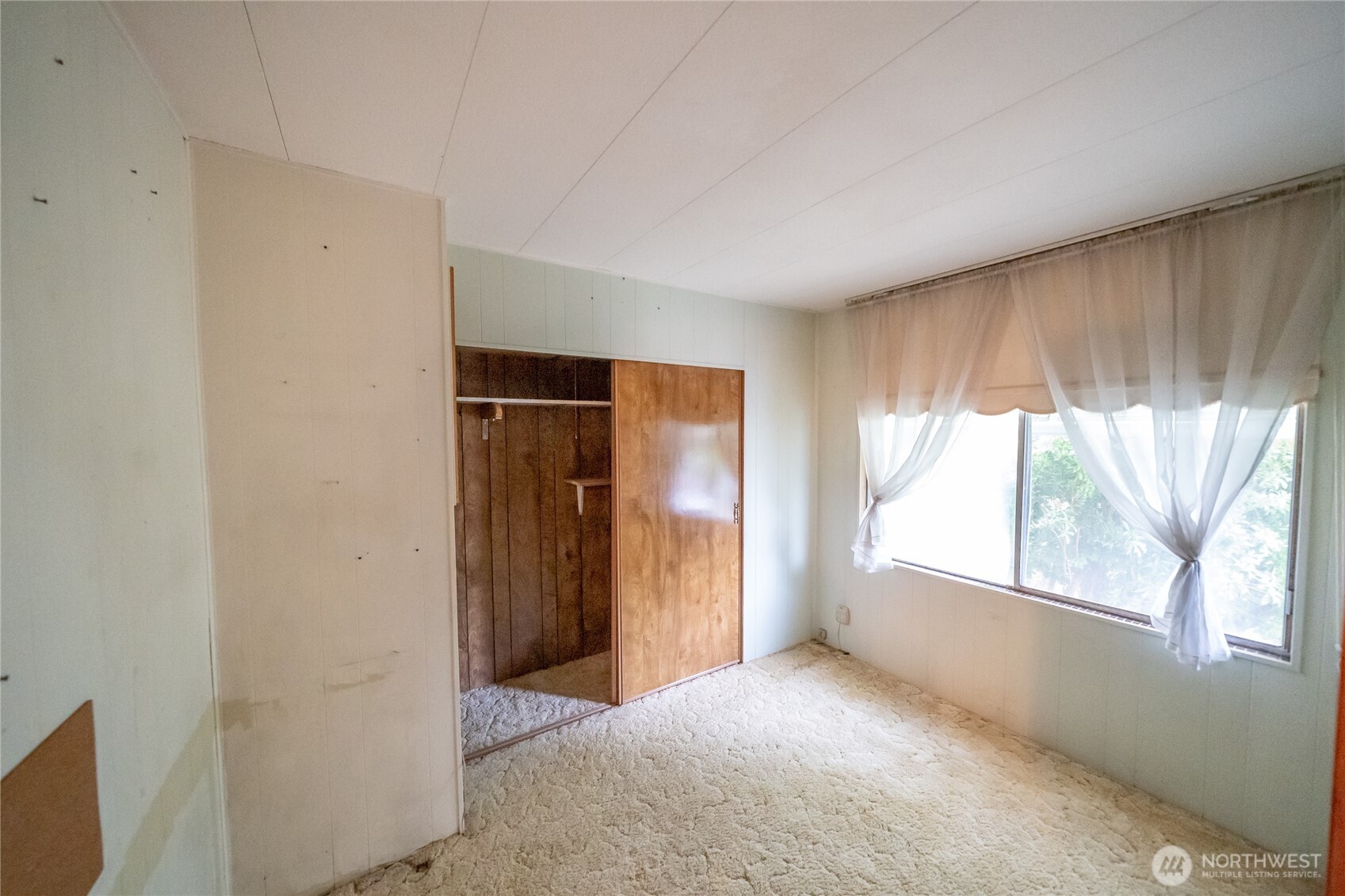 57 Clemons Road, Unit 71 Montesano, WA 98563 - Photo 17 of 26 an empty room with windows and closet