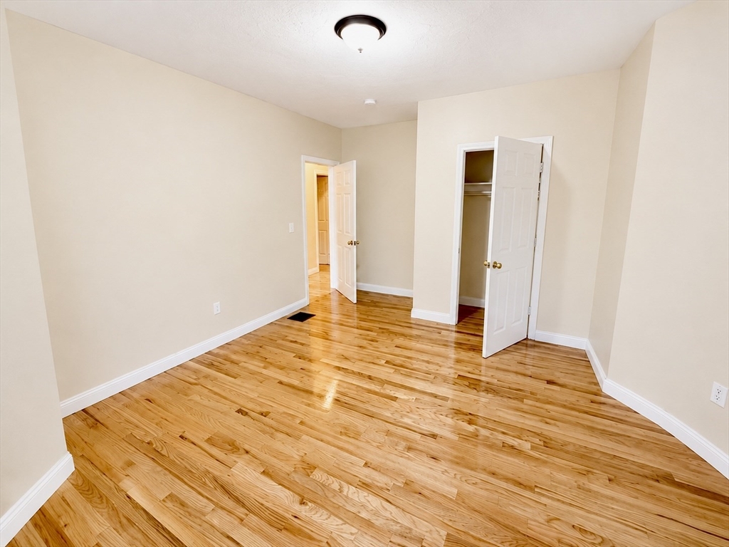 19 Dunlap Street, Unit 1 Boston, MA 02124 - Photo 2 of 9 a view of an empty room
