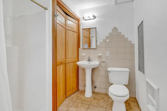 a bathroom with a sink and a toilet
