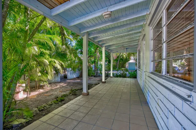 a view of backyard with green space