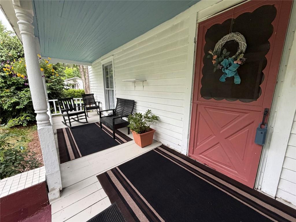 209 Old Perry Road Marshallville, GA 31057 - Photo 23 of 40 a view of a living room and a balcony