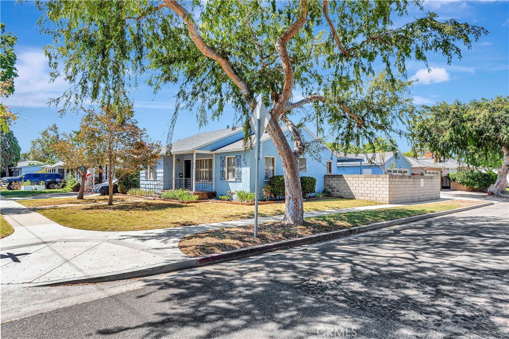 1949 Chatwin Avenue Long Beach, CA 90815 - Photo 3 of 3 a view of a house with basketball court