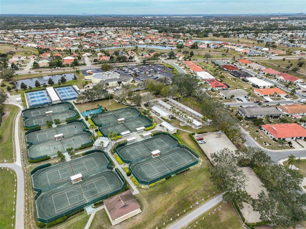 705 Baltusrol Way Sun City Center, FL 33573 - Photo 59 of 59 an aerial view of residential houses with yard
