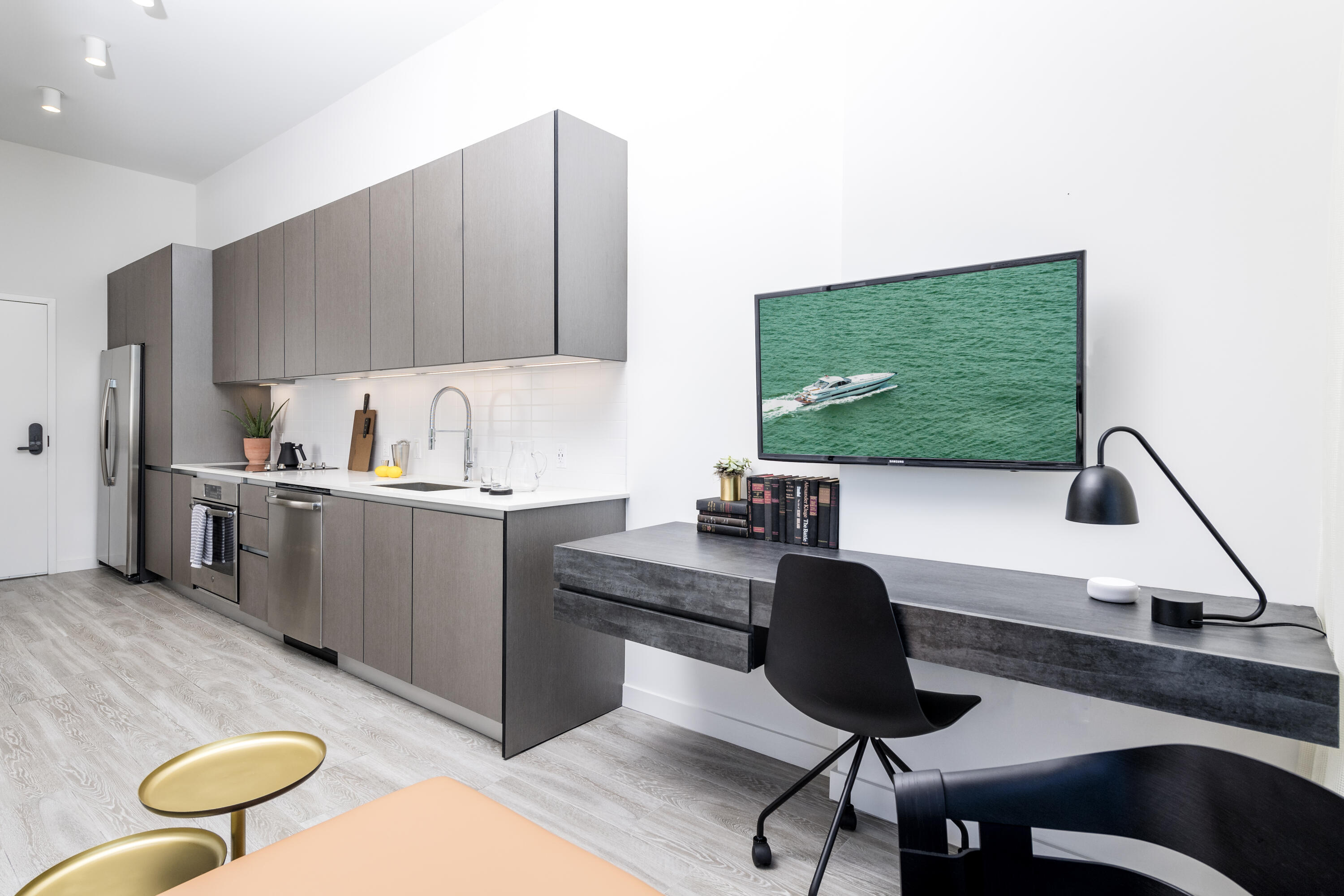 240 Northwest 25th Street, Unit 707 Miami, FL 33127 - Photo 13 of 16 a kitchen with a sink cabinets and window