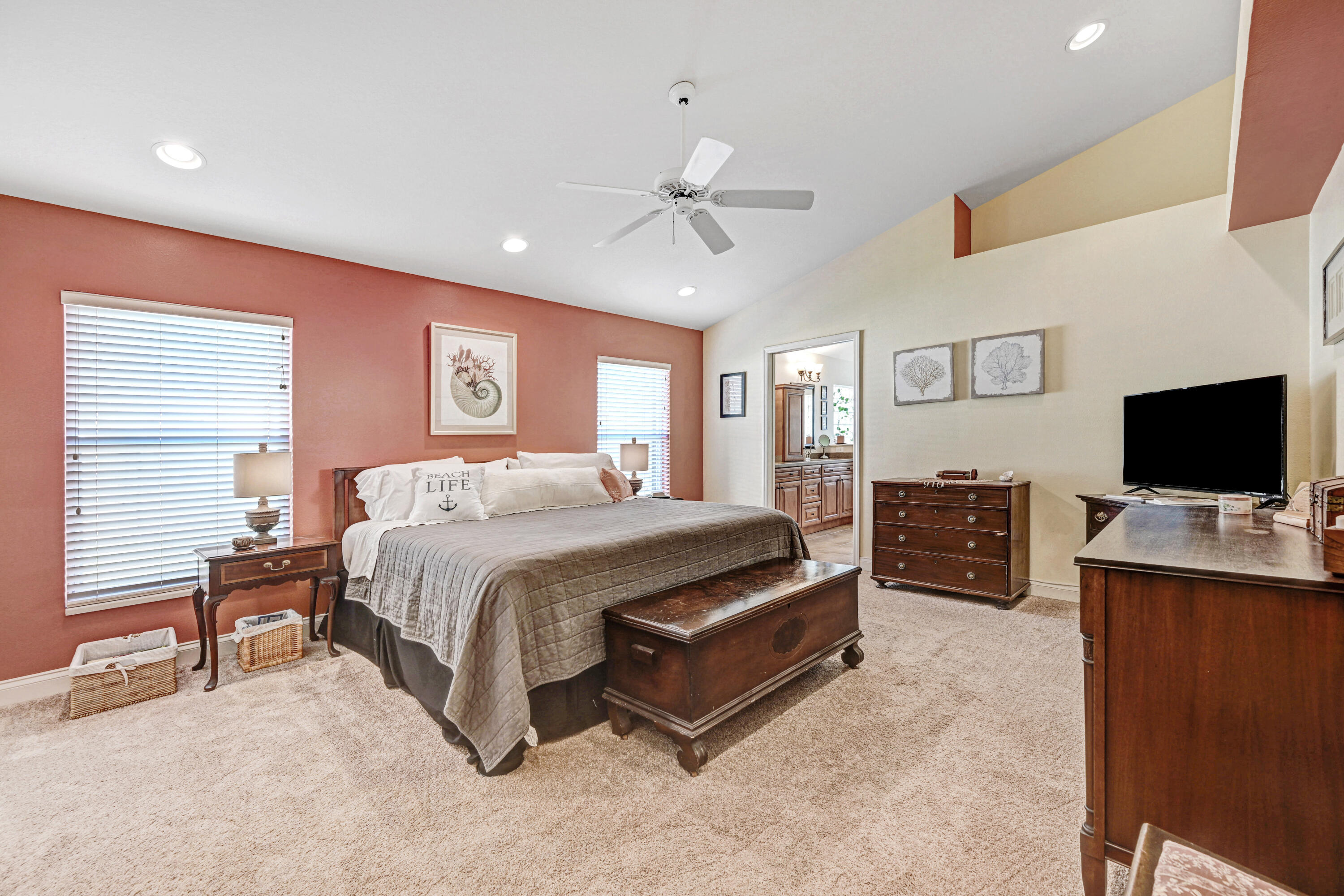 2795 Whistler Street Melbourne, FL 32904 - Photo 21 of 45 a spacious bedroom with a bed and a flat screen tv