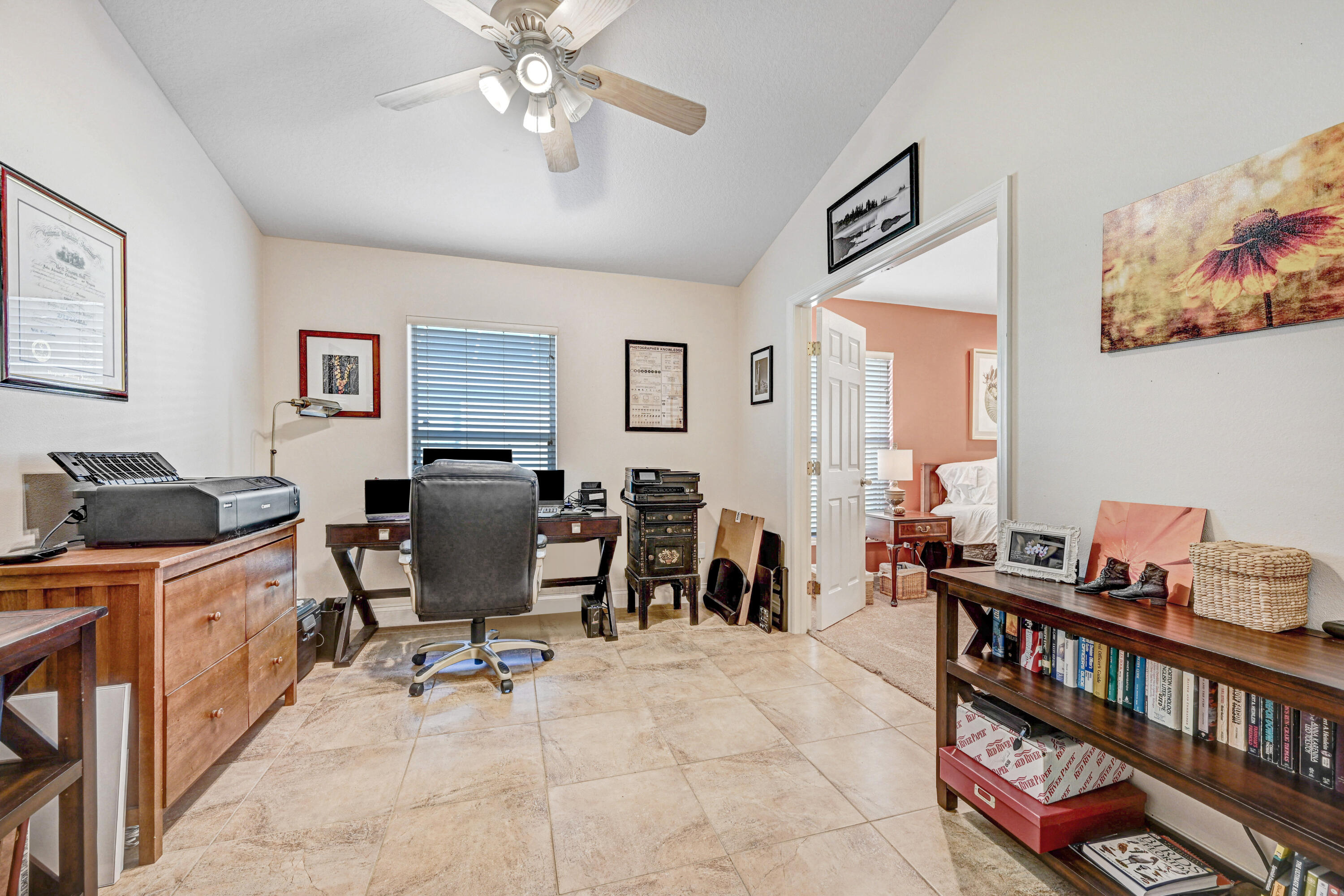 2795 Whistler Street Melbourne, FL 32904 - Photo 27 of 45 a view of a livingroom with workspace and a window