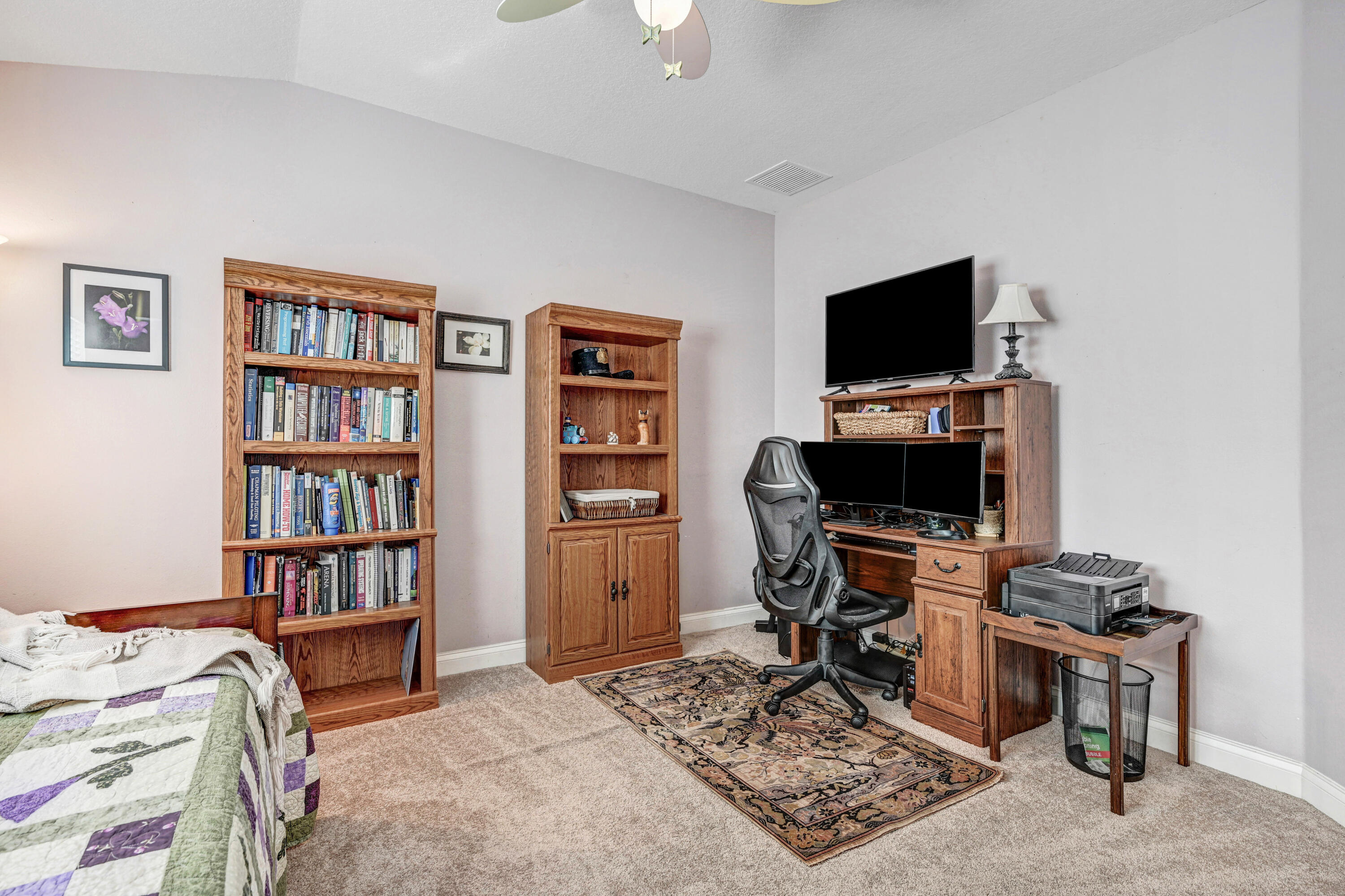 2795 Whistler Street Melbourne, FL 32904 - Photo 30 of 45 a view of a livingroom with workspace and a couch