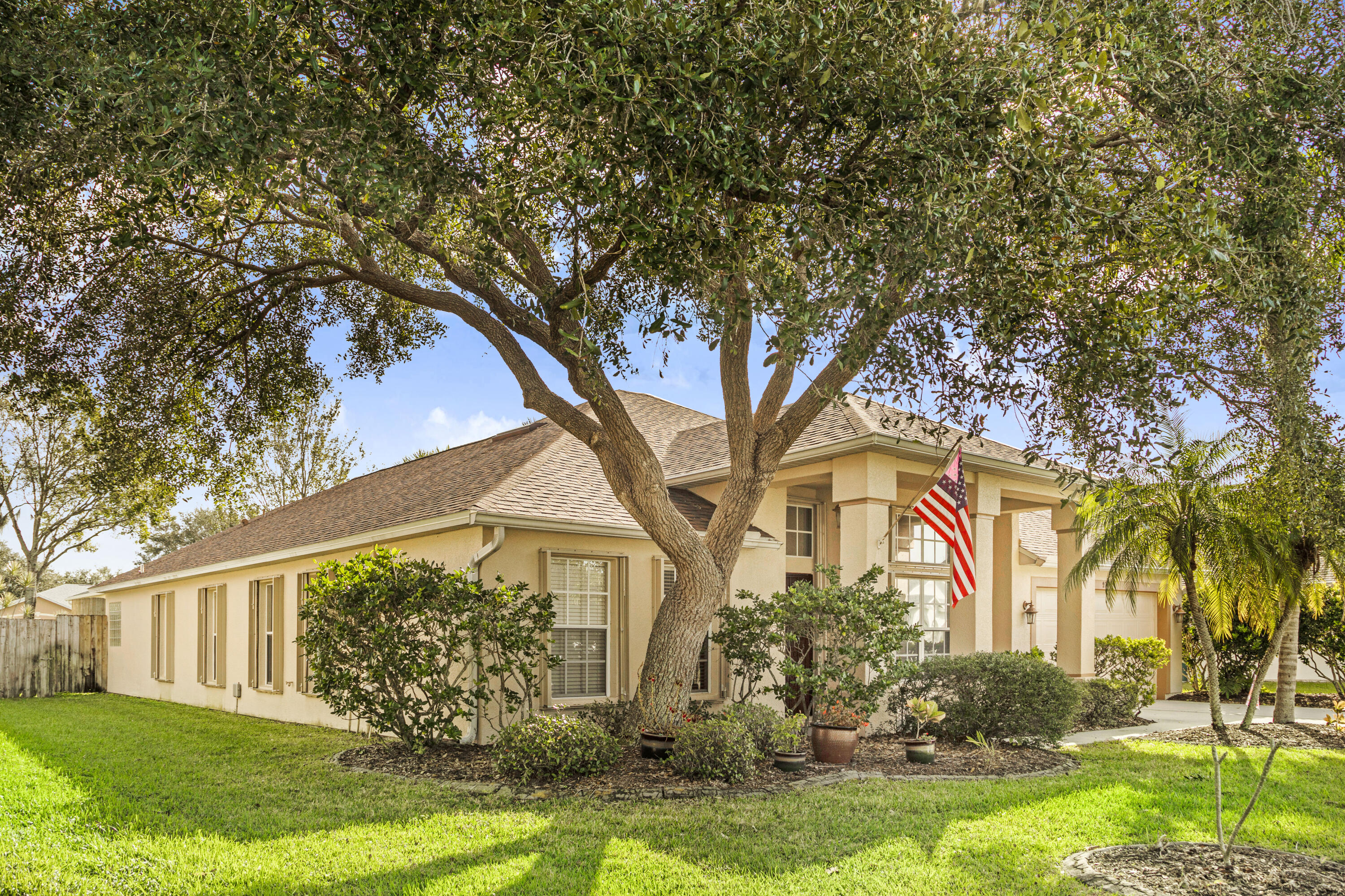 2795 Whistler Street Melbourne, FL 32904 - Photo 3 of 45 a front view of a house with garden