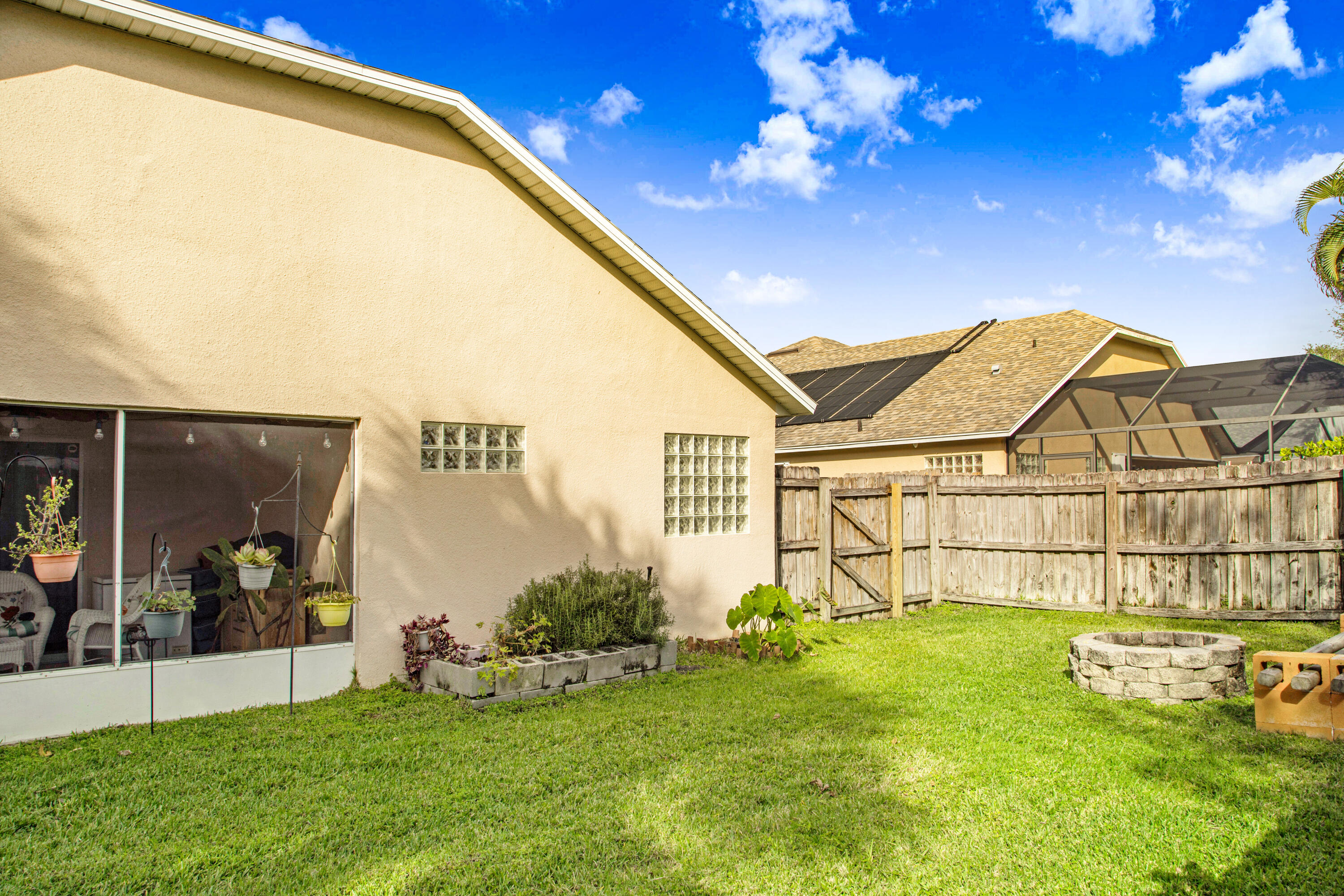2795 Whistler Street Melbourne, FL 32904 - Photo 37 of 45 a view of an house with backyard space and balcony