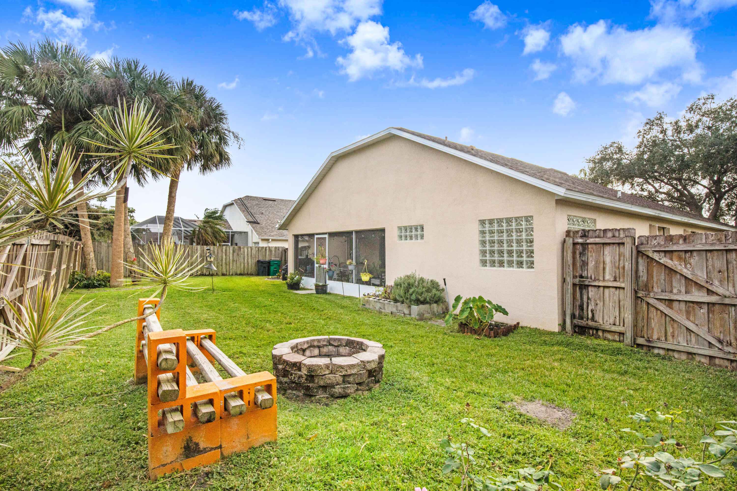 2795 Whistler Street Melbourne, FL 32904 - Photo 40 of 45 a front view of house with yard and outdoor seating