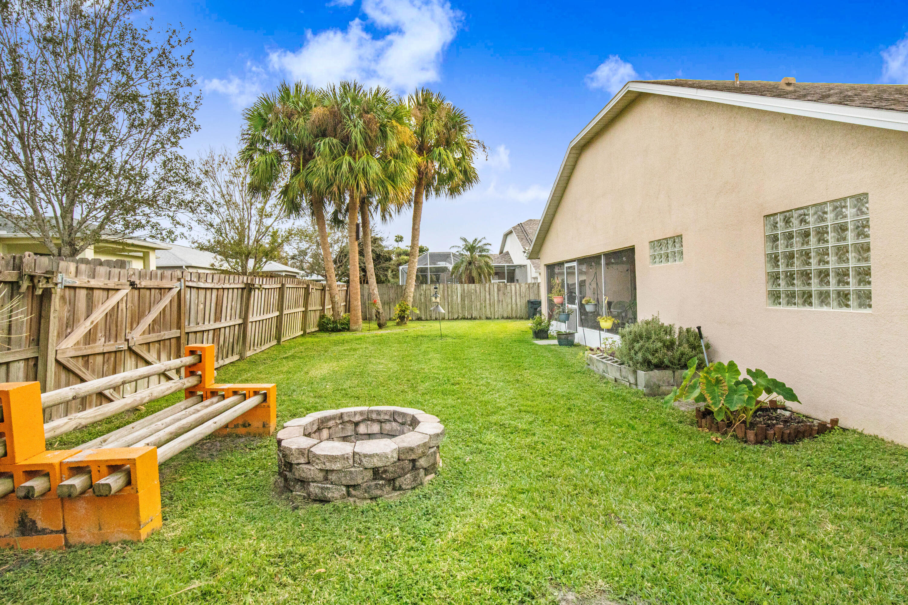 2795 Whistler Street Melbourne, FL 32904 - Photo 4 of 45 a view of a backyard with a garden and plants