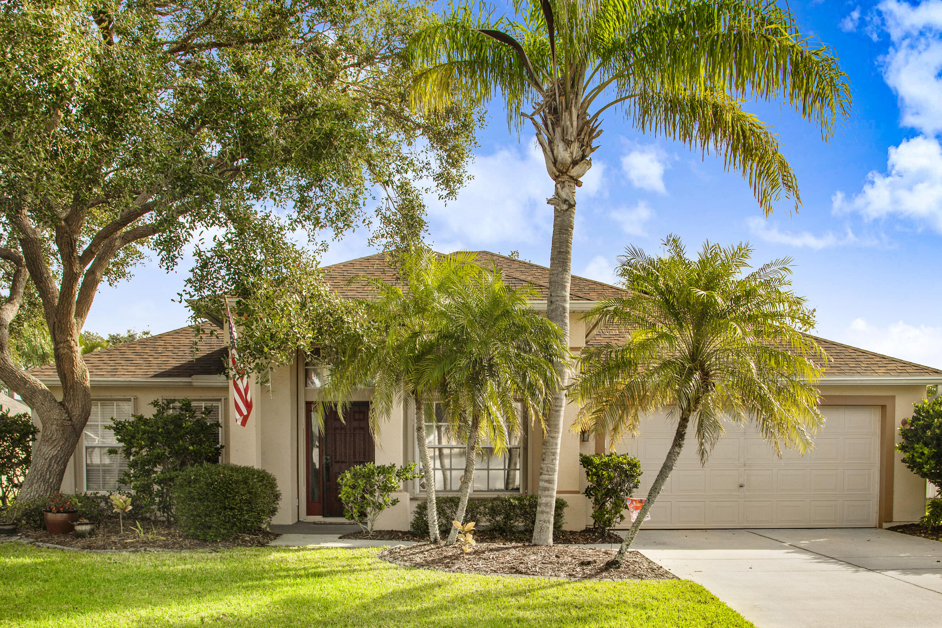 2795 Whistler Street Melbourne, FL 32904 - Photo 42 of 45 a view of a palm trees in front of a house