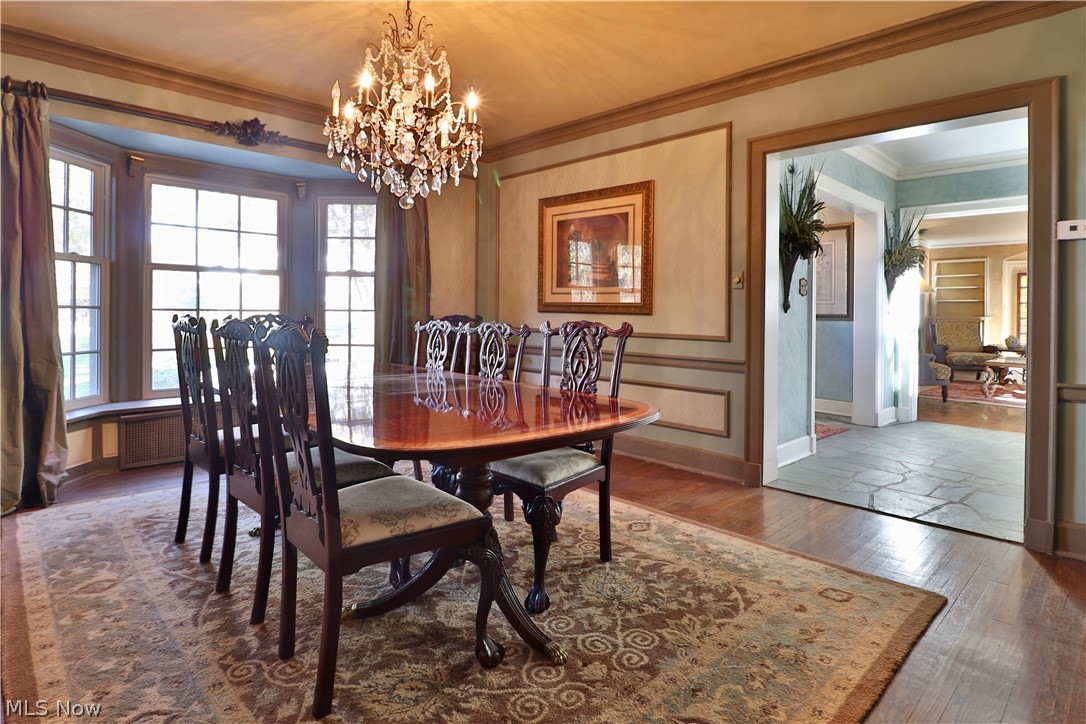 2220 Ridgewood Road Akron, OH 44313 - Photo 11 of 33 Stunning Formal Dining Room with beautiful chandelier, extensive molding, hardwood floors and Bay Window.