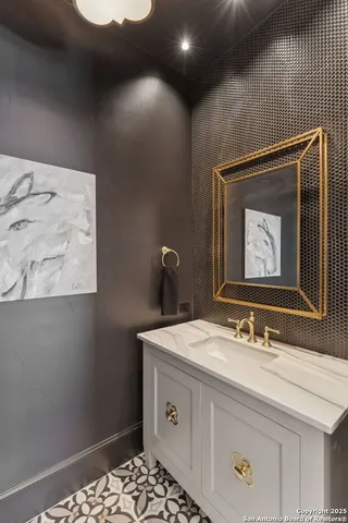 a living room with furniture and a rug