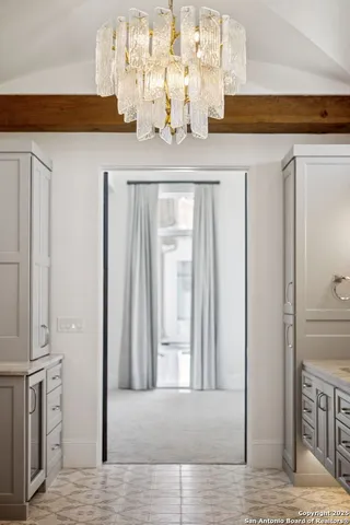 a view of a table and chairs in a patio