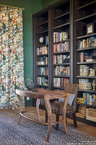 a kitchen with stainless steel appliances granite countertop a refrigerator stove and sink