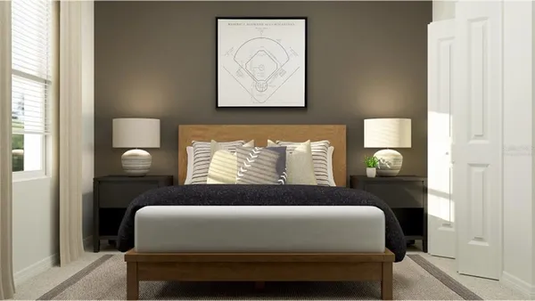 a bedroom with a bed and window