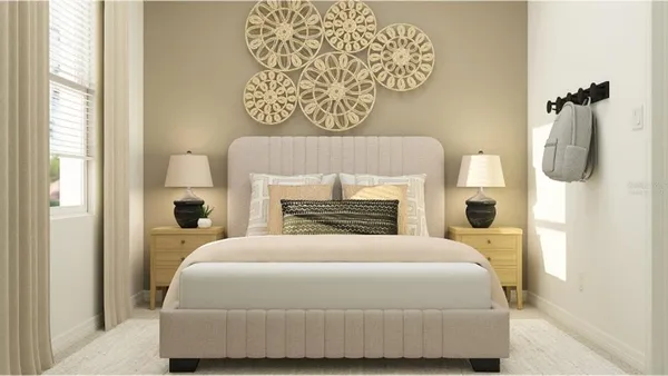 a bedroom with a bed and a fireplace