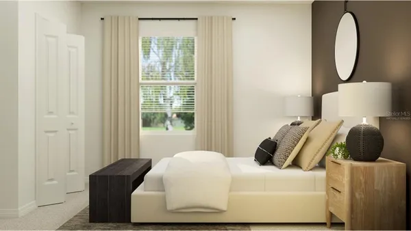 a bedroom with bed and a window