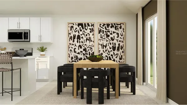 a dining room with furniture and window