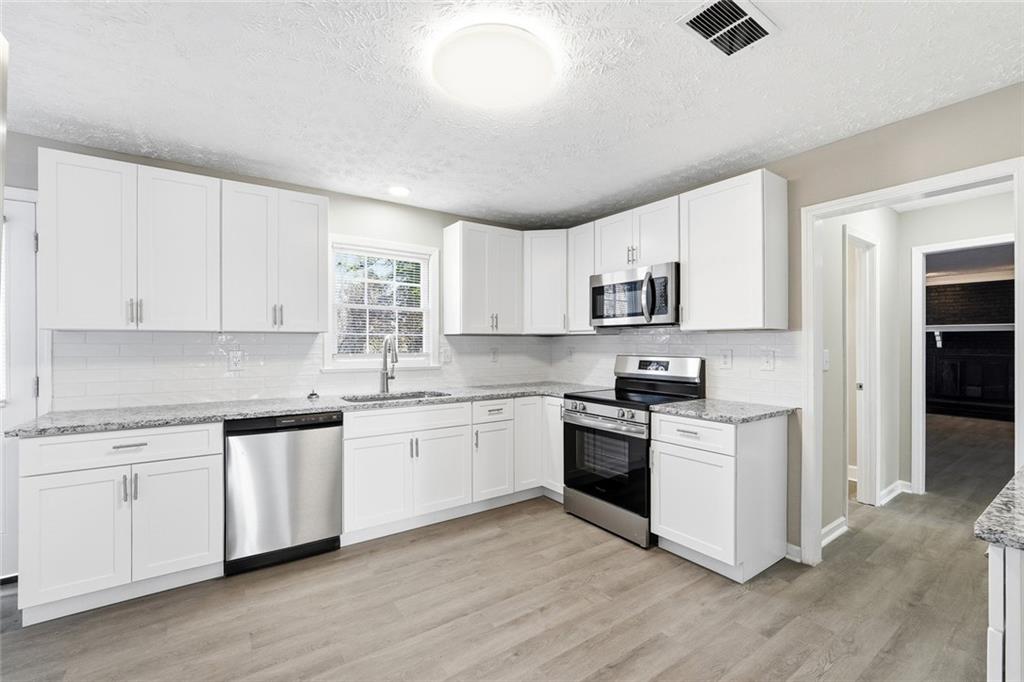 4043 Colonial Drive Southwest Lilburn, GA 30047 - Photo 9 of 25