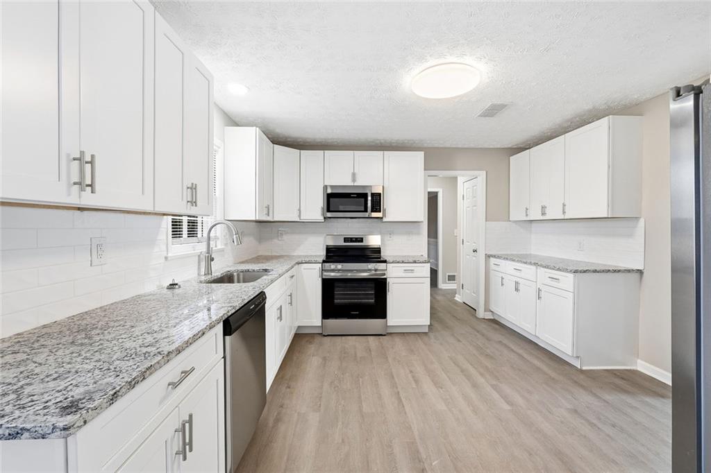 4043 Colonial Drive Southwest Lilburn, GA 30047 - Photo 10 of 25