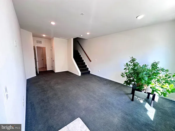 a view of livingroom with furniture and window
