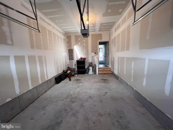 a view of a swimming pool and lounge chair