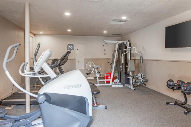 a view of a room with gym equipment