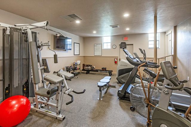 a view of a room with gym equipment