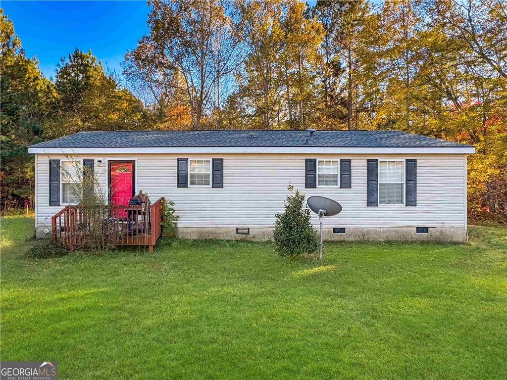 230 Surrett Road Buchanan, GA 30113 - Photo 1 of 17 a front view of house with yard and green space