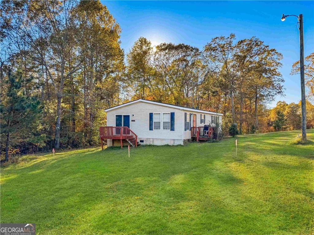 230 Surrett Road Buchanan, GA 30113 - Photo 3 of 17 a view of a house with a yard