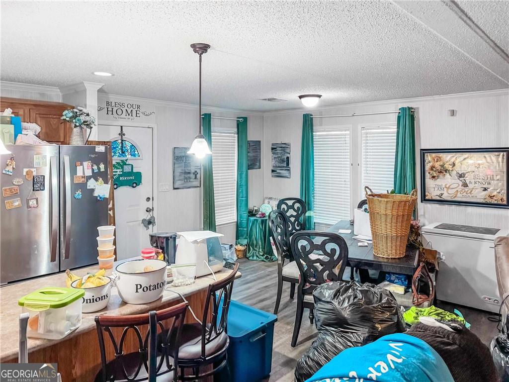 230 Surrett Road Buchanan, GA 30113 - Photo 8 of 17 a view of a dining room with furniture window and outside view