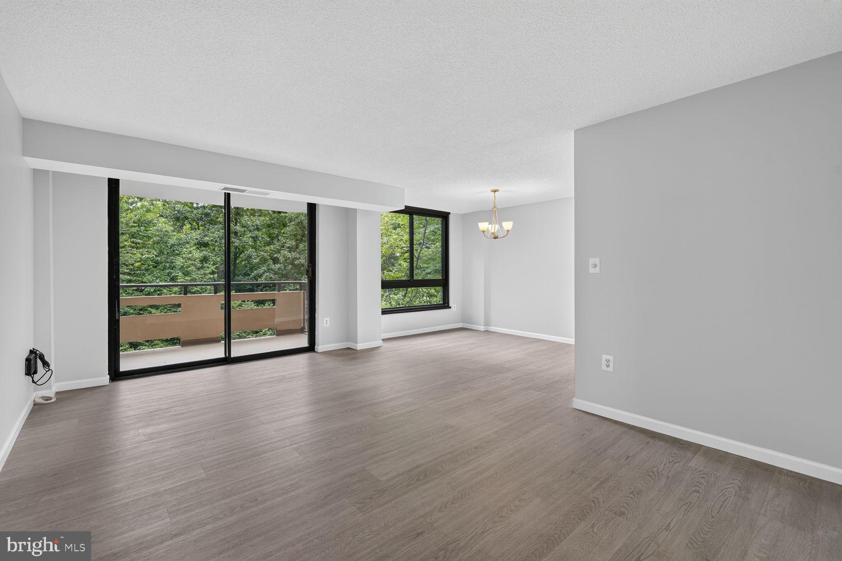 1808 Old Meadow Road, Unit 601 McLean, VA 22102 - Photo 4 of 19 Living Room with New Double Pane Windows