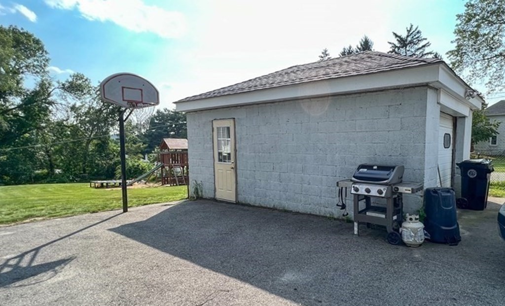 97 Bay State Road Methuen, MA 01844 - Photo 22 of 26 a view of a bench in patio of backyard