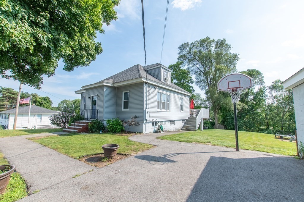 97 Bay State Road Methuen, MA 01844 - Photo 23 of 26 a view of a house with a yard