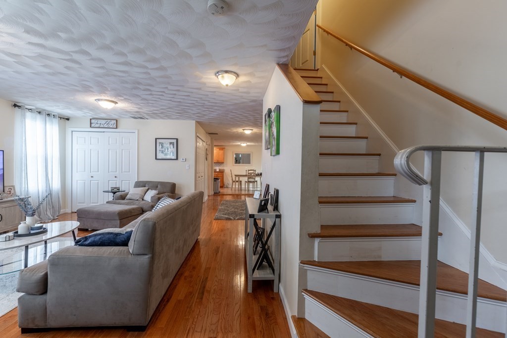 97 Bay State Road Methuen, MA 01844 - Photo 5 of 26 a living room with furniture and wooden floor