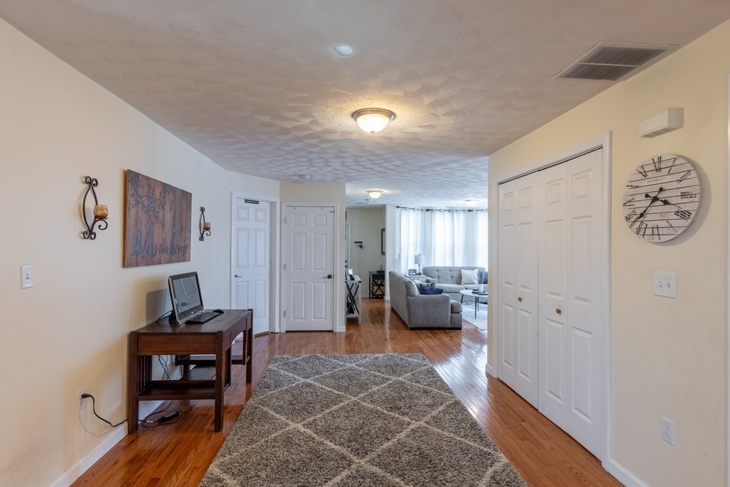 97 Bay State Road Methuen, MA 01844 - Photo 7 of 26 a living room with furniture and a couch
