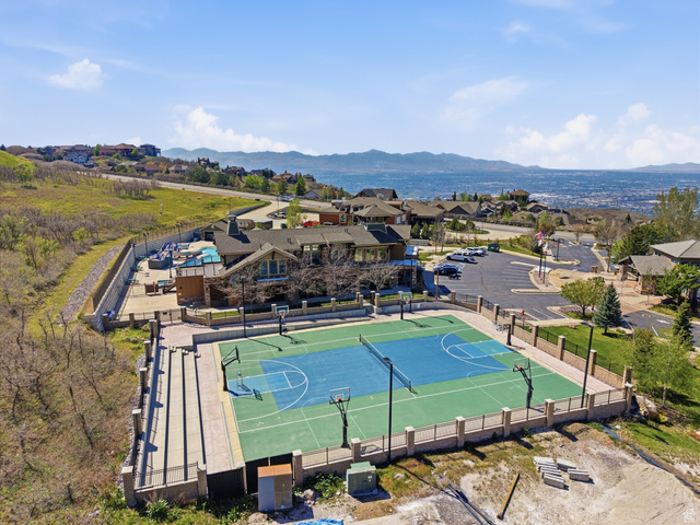 2007 Fielding Hill Lane Draper, UT 84020 - Photo 79 of 83 Outdoor recreation area featuring a full-size tennis court with basketball hoops, a swimming pool, and a structured clubhouse