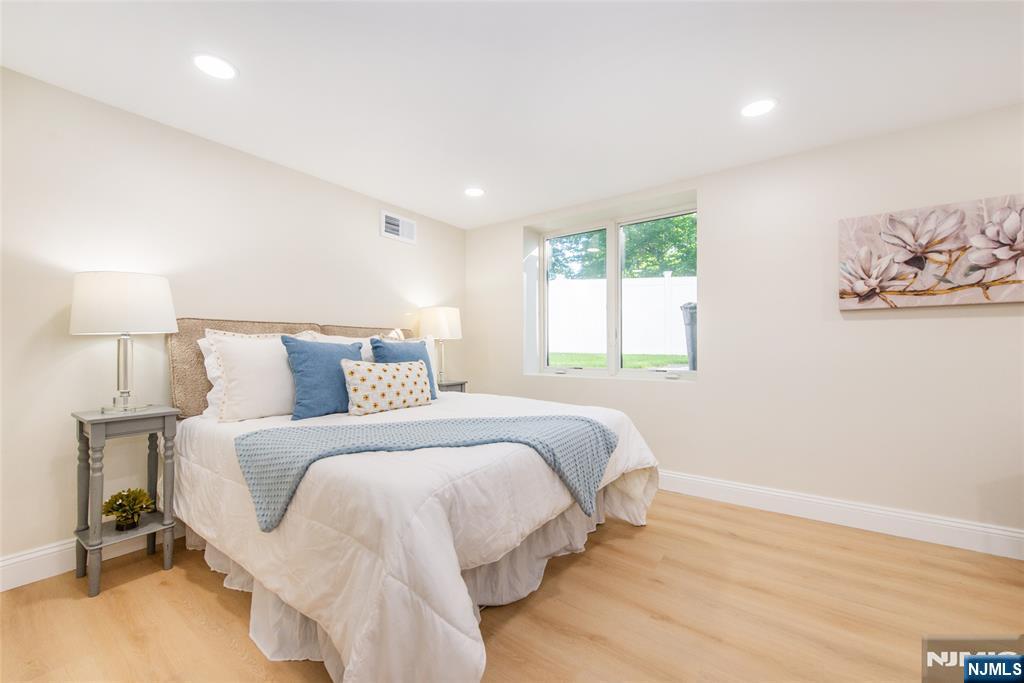145 Grove Street Mahwah, NJ 07430 - Photo 23 of 30 a bedroom with a bed and a window